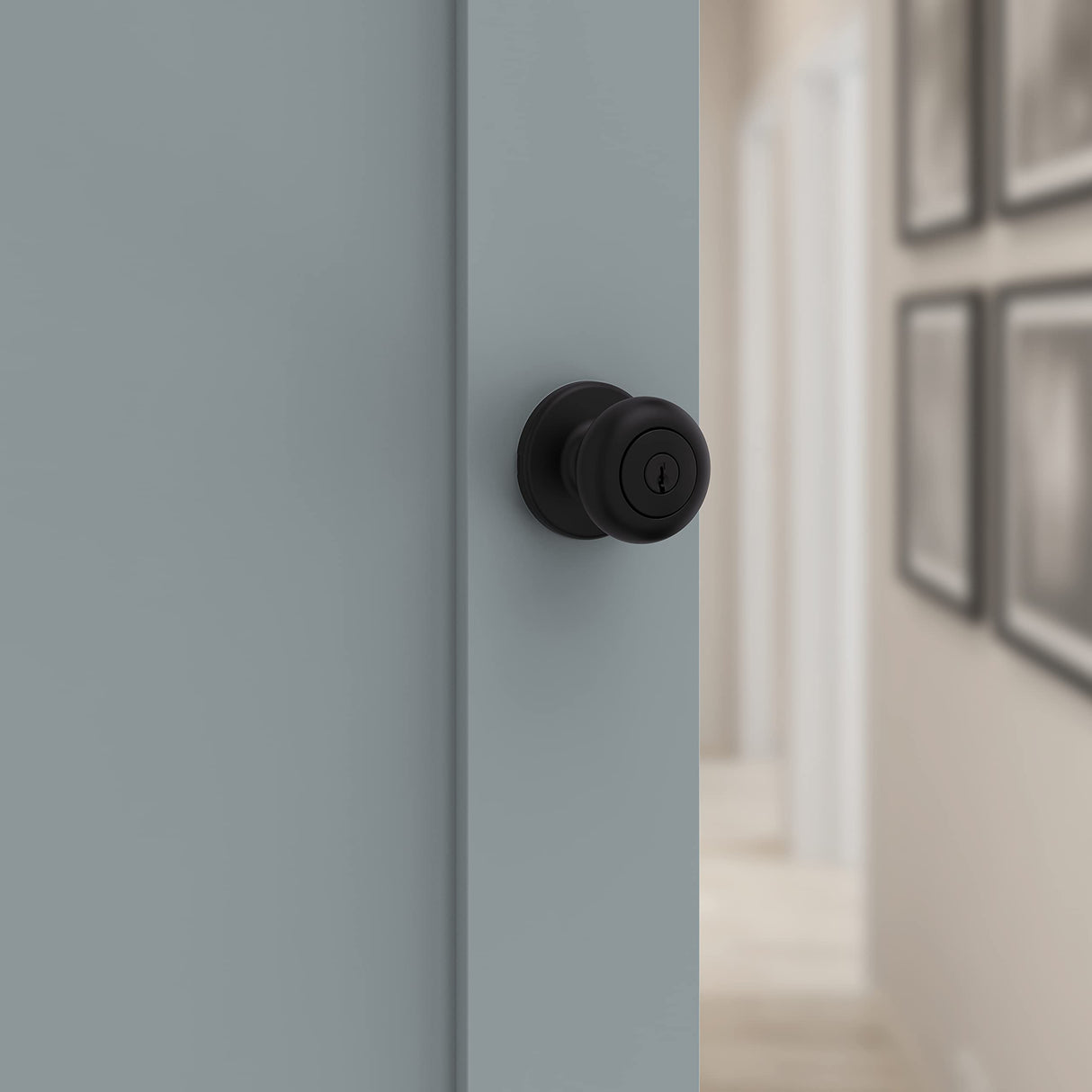 Kwikset Cove Entry Door Knob with Lock and Key, Secure Keyed Handle Exterior Doorknob, Front Entrance and Bedroom, Matte Black, Pick Resistant SmartKey Rekey Security