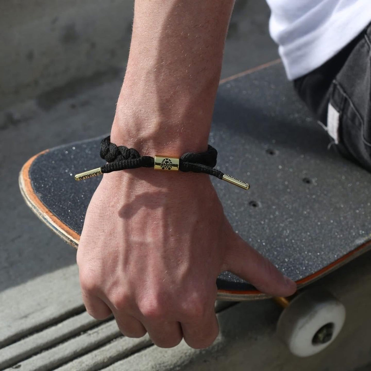 Rastaclat Braided Bracelet for Men and Women - Onyx II Black/Gold Bracelet | Adjustable Stackable & Braided by Hand (Medium/Large)