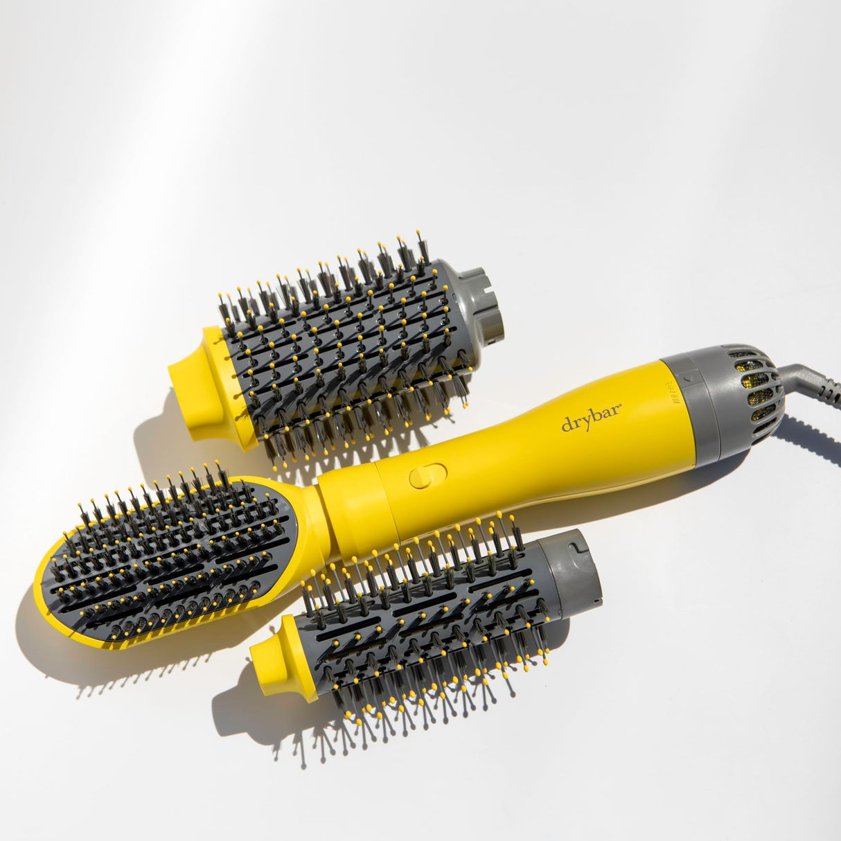 Drybar The Triple Shot Interchangeable Blow-Dryer Brush | 3-in-1 Styling Tool for Voluminous Blowouts, Defined Curls or Waves, and Smooth Straight Looks