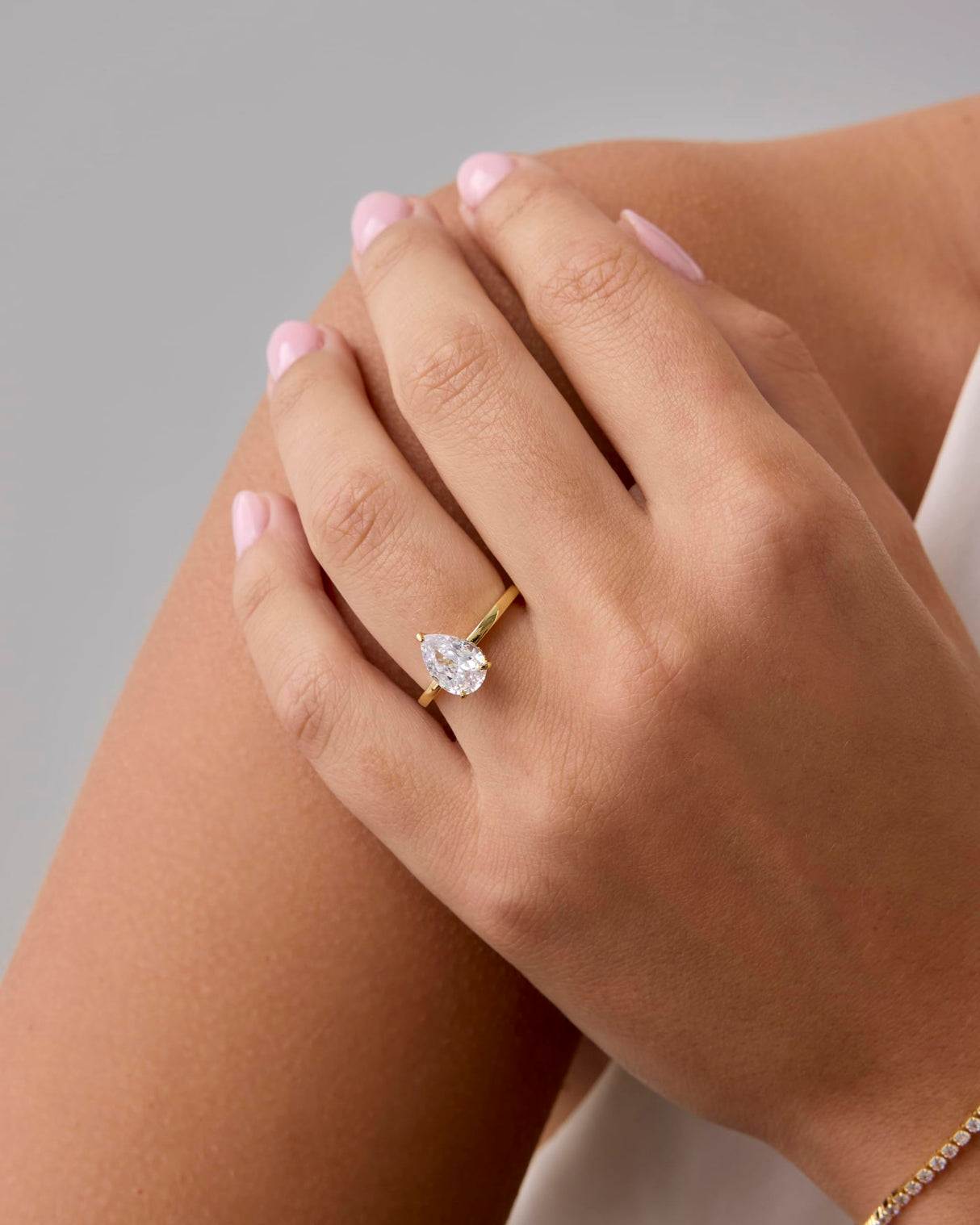 PAVOI 14K Yellow Gold Plated Simple 2.5CT Pear Cubic Zirconia Hidden Halo Eternity Band Bridal Wedding and Engagement Rings for Women - Statement Ring - Size 6