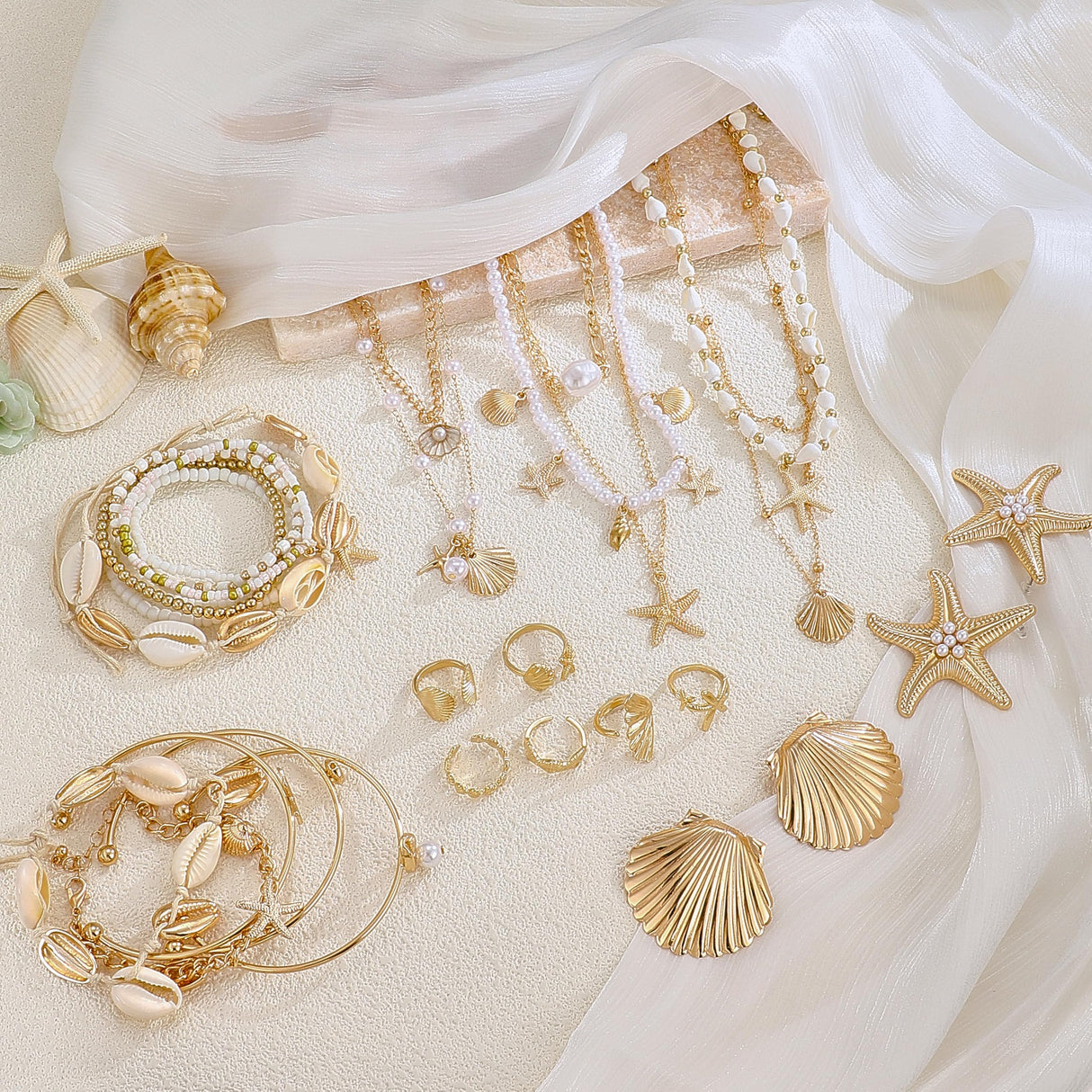 Vieyomn 32 Pcs Starfish Seashell Jewelry Set for Women Layer Necklace Bracelets Stackable Shell Starfish Rings Stud Earrings Pearl Beach Vacation Accessories