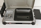 Coleman Tabletop 2-in-1 Grill & Stove with 2 Adjustable Burners, Propane Grill/Stove with Push-Button Starter, Wind Guards, Grease Tray, & 20,000 BTUs of Power for Camping, Tailgating, & More