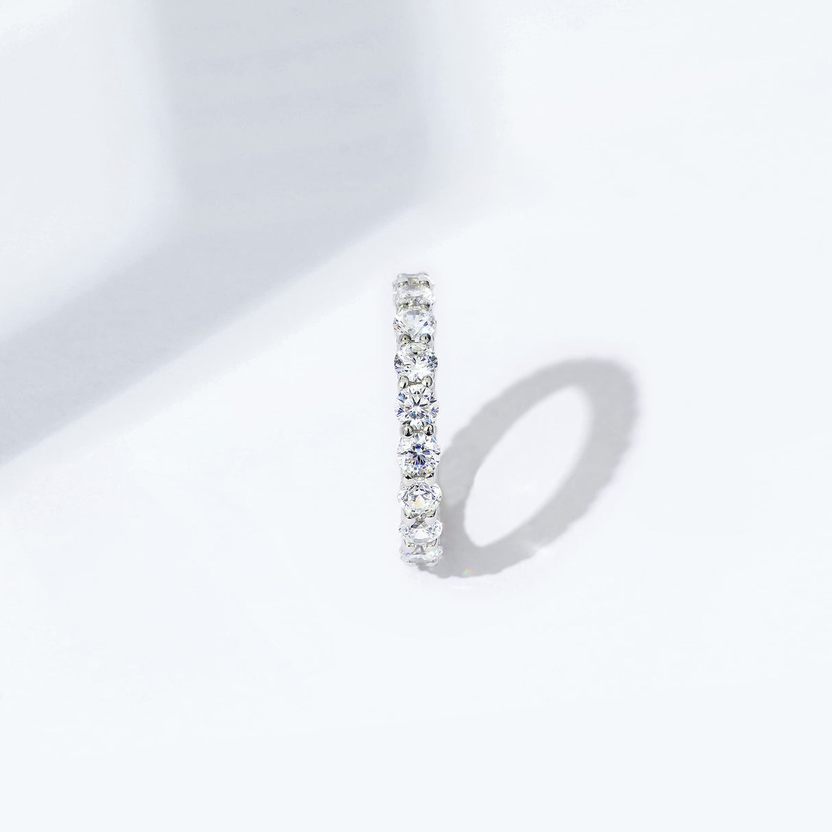 Amazon Essentials Platinum-Plated Sterling Silver Infinite Elements Cubic Zirconia (3 cttw) All-Around Ring, Size 5