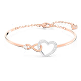 Swarovski Hyperbola Women's Bangle Bracelet with a Rose-Gold Tone Plated Bangle, Clear Crystals and Lobster Clasp