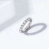 Amazon Essentials Platinum-Plated Sterling Silver Infinite Elements Cubic Zirconia (3 cttw) All-Around Ring, Size 5