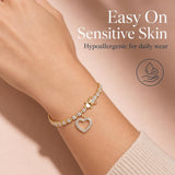 MORGAN & PAIGE Bronze 18k Yellow Gold Plated Heart Tennis Bracelet 7.25in