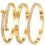 Xigocorsn Gold Bangles Bangle Bracelets Set for Women, genuine gold electroplating 3 Piece Elliptical Design with Cubic Zirconia Accents, 2.36 Inch Diameter, Waterproof Stainless Steel