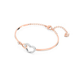 Swarovski Hyperbola Women's Bangle Bracelet with a Rose-Gold Tone Plated Bangle, Clear Crystals and Lobster Clasp