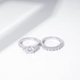 Amazon Essentials Sterling Silver Platinum Plated, Infinite Elements, Cubic Zirconia, Three Stone Ring with Matching Wedding Band, Size 7