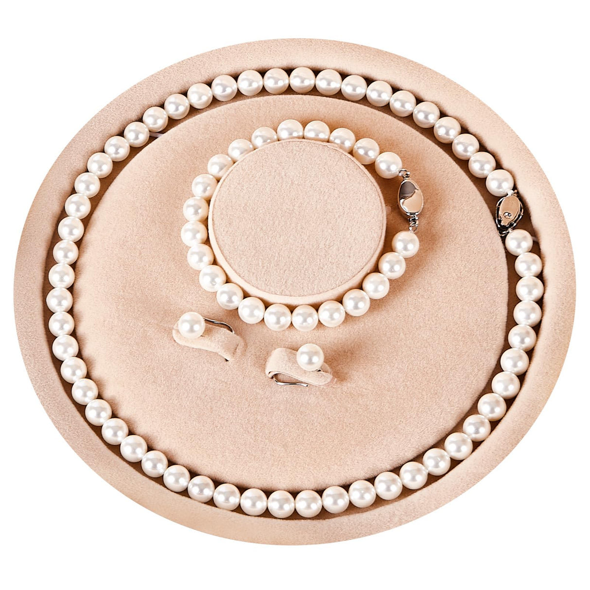 Pearl Necklace Set, featuring an exquisite bracelet, stud earrings, and necklace. This pearl necklace, bracelet, and ring ensemble radiates elegant charm, effortlessly elevating the sophistication of everyday attire. Perfect for weddings, banquets, or bir