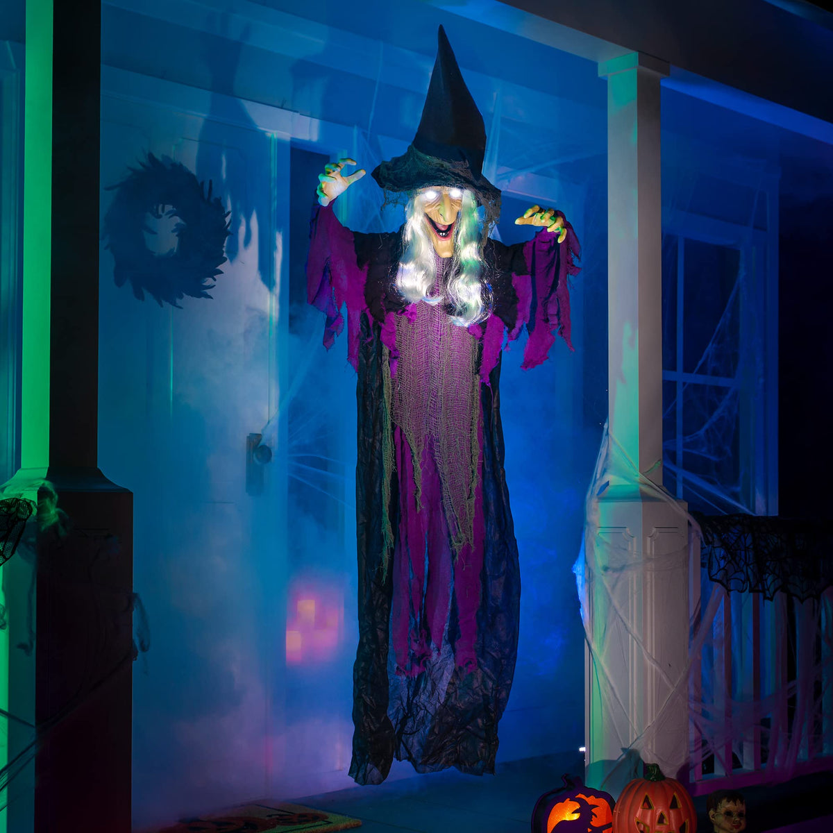 JOYIN 72” Halloween Hanging Witch Decorations Outdoor, Flying Talking Ghost Decor Light Up Eyes Sound Activated, Outside Indoor Haunted House Prop for Lawn Yard Garden, Purple