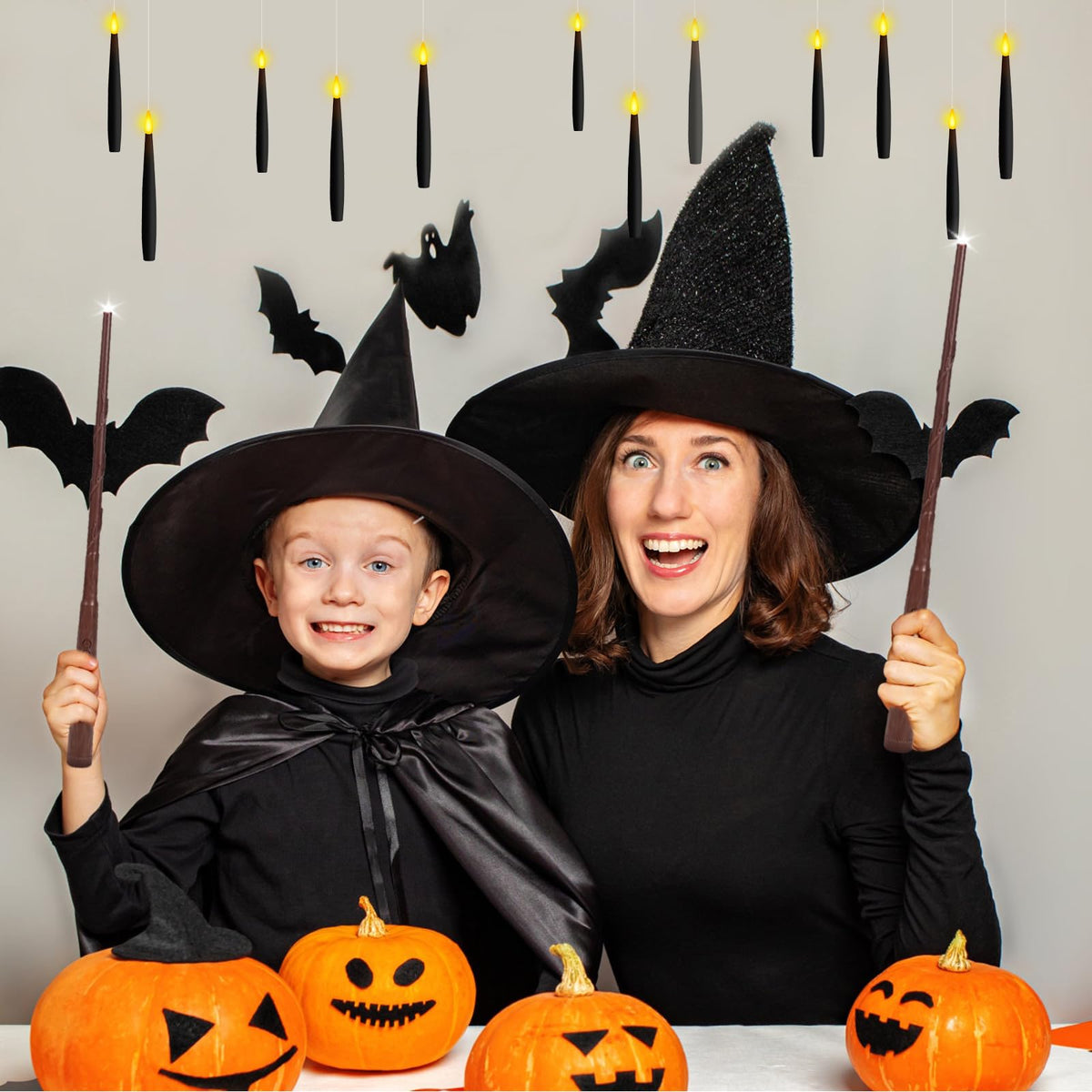 NURADA Floating Candles with Wand Remote Timer - Magic LED Hanging Flameless Taper Candles Flickering Battery Operated for Halloween Birthday Theme Party Holiday Home Window Decor - Black 12 Pack