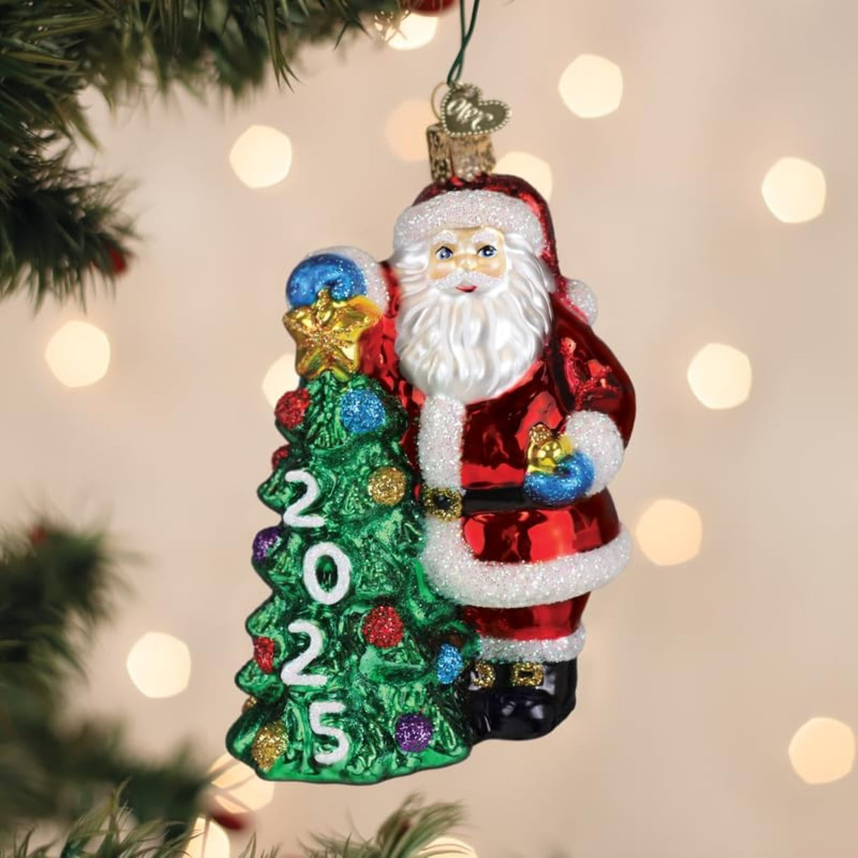 Old World Christmas 2025 Santa with Tree Glass Ornament for Holiday Tree