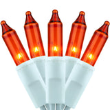 YULETIME 200 Orange Christmas Lights, Pack of 2 Strands of 21 ft 100 Count UL Certified Incandescent Mini String Light (Orange - White Wire)