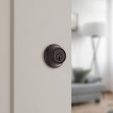 Kwikset 660 Deadbolt Lock, Venetian Bronze Round Exterior Keyed Front Entry Door, Pick Resistant SmartKey Rekey Security, Single Cylinder Dead Bolt
