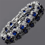 RIZILIA BLOSSOM Blue Sapphire CZ 18K White Gold Plated Tennis Bracelet