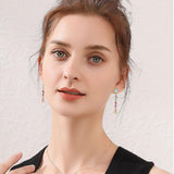 YEPZOKO Long Crystal Dangle Earrings for Women Wedding Bridal Colorful Rhinestone Cubic Zirconia Drop Earrings for women Mom Wife (Multicolor-light)