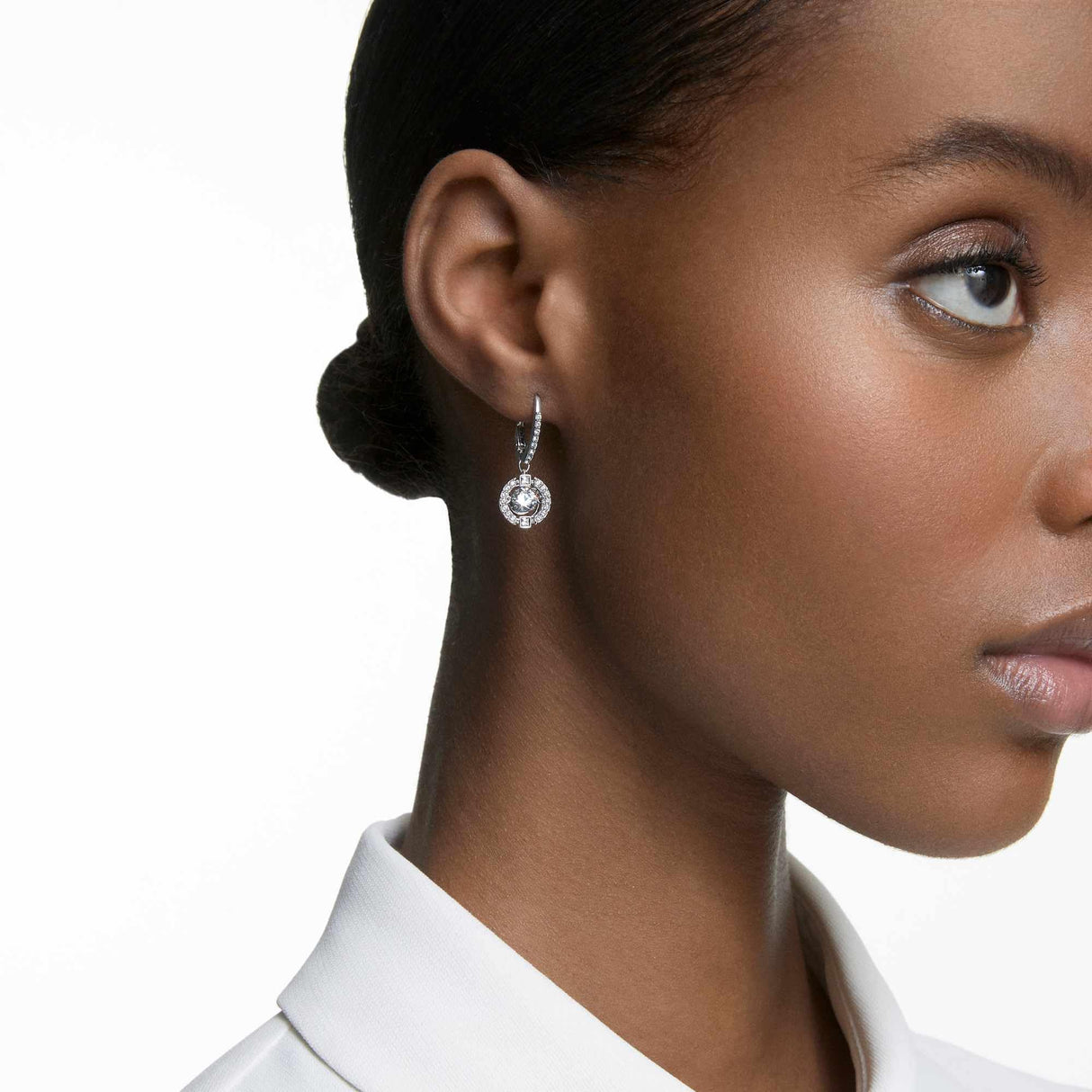 Swarovski Una Drop Pierced Earrings with Crystal Pavé Surrounding a Round, White Floating Stone on a Rhodium Finished Setting