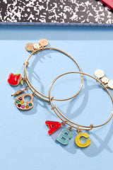 Alex and Ani Teacher’s Multi Charm Textured Bangle - School-Inspired Charms: Paint Palette, Pencil, Red Apple, Gold Finish, Cute Bracelets for Women, Easy Stack
