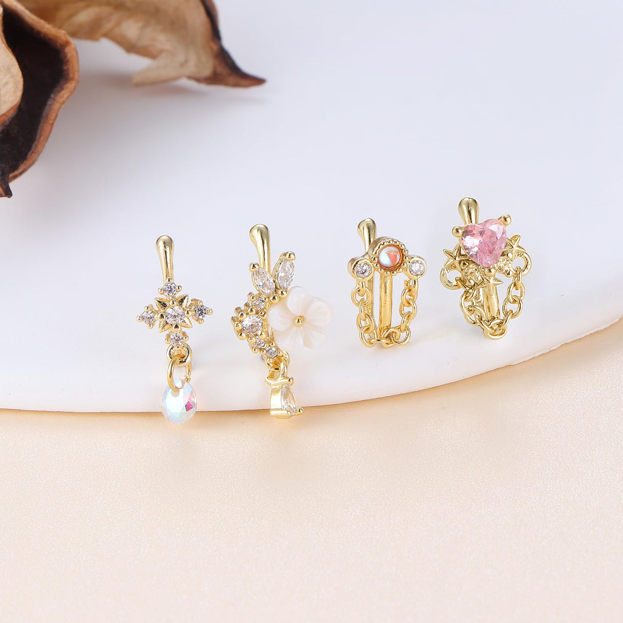 Florideco 12Pcs Nose Cuff Fake Nose Ring Hoop Clip on Nose Rings CZ Dangle Cartilage Tragus Ring Nose Cuff Non Piercing for Women Men Gold