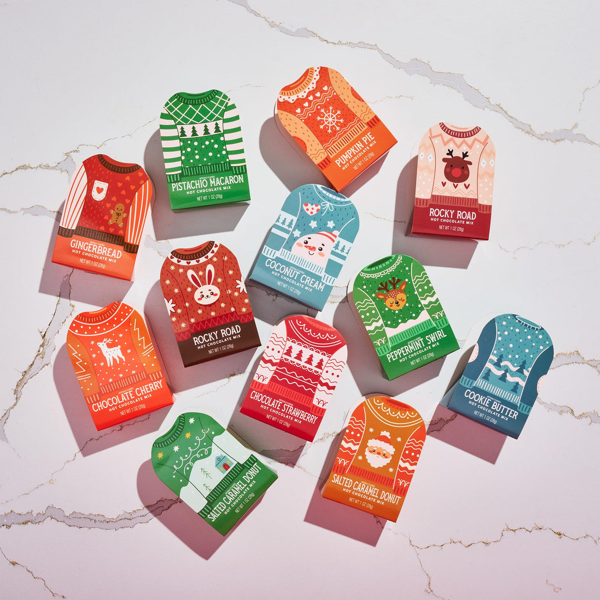 Thoughtfully, Holiday Hot Chocolate Mix Gift Set, Ugly Sweater Cocoa Sampler with 12 Flavored Packets Including Peppermint, Gingerbread, Rocky Road & More, Christmas Gift Box, Set of 12