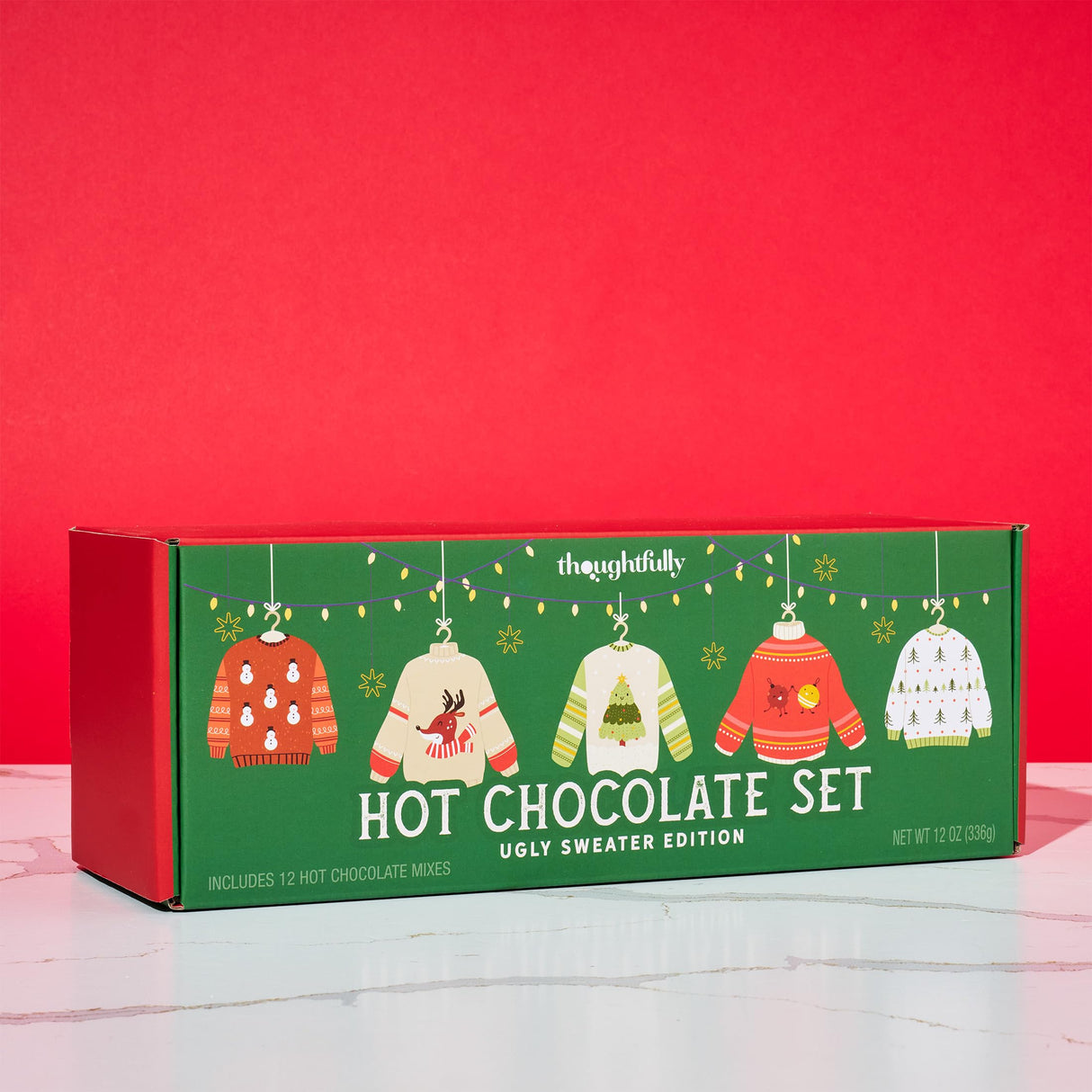 Thoughtfully, Holiday Hot Chocolate Mix Gift Set, Ugly Sweater Cocoa Sampler with 12 Flavored Packets Including Peppermint, Gingerbread, Rocky Road & More, Christmas Gift Box, Set of 12