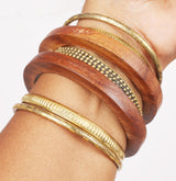 Touchstone wooden women bamboo wood jewelry african bangle bracelets gold bangles brown boho accessories chunky vacation brass statement natural rustic Indian bollywood handcrafted. Set of 7