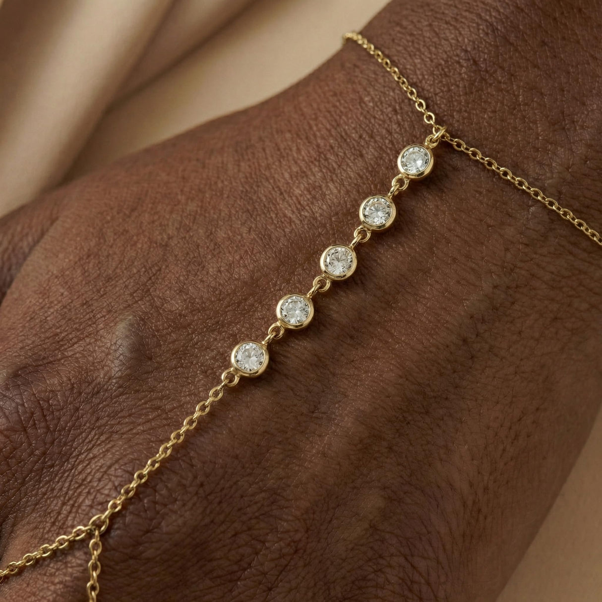 Faire de la Mode Hand Chain Bracelet, 14K Gold Plated with 5 CZ