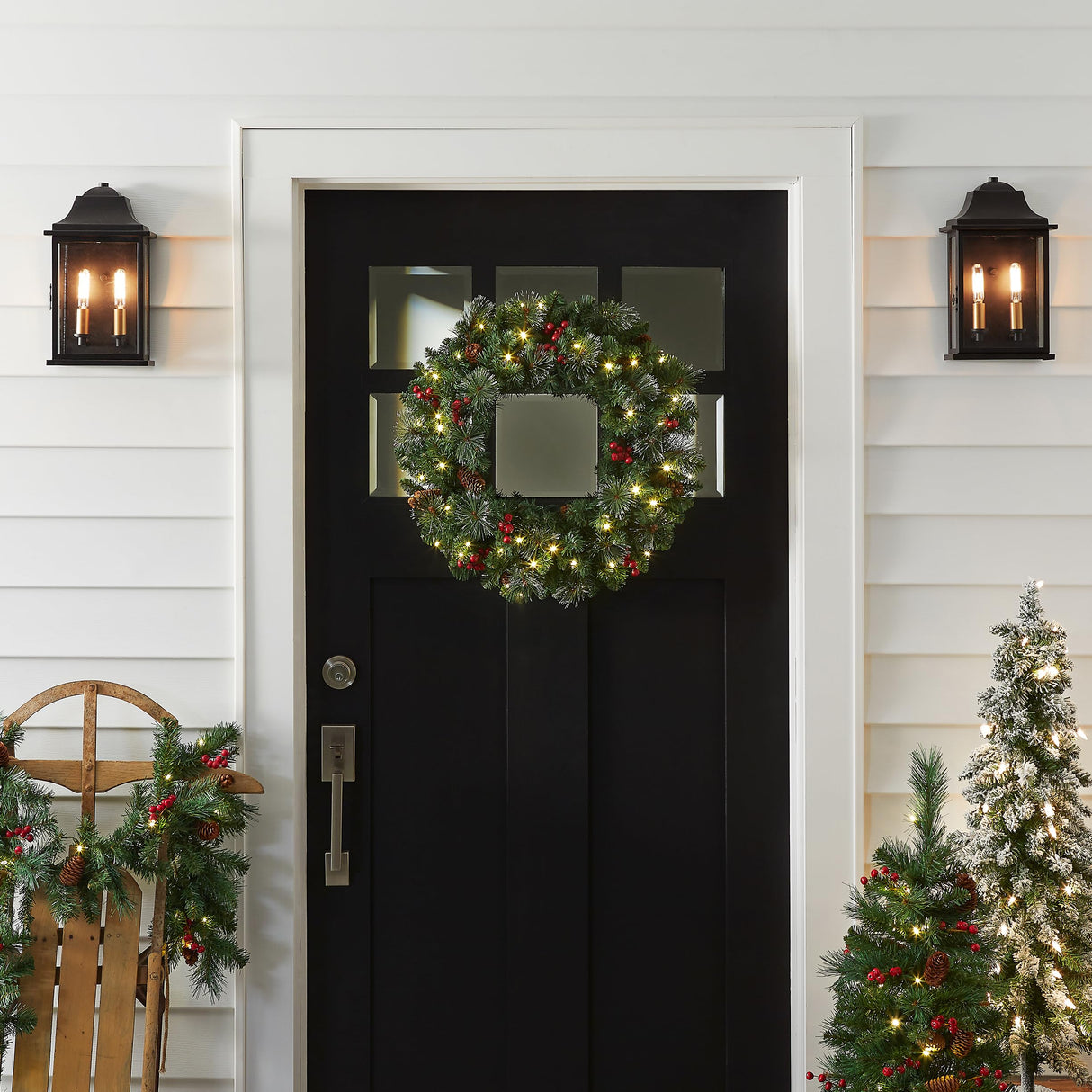 National Tree Company Pre-Lit Artificial Christmas Wreath, Green, Crestwood Spruce, White Lights, Decorated with Pine Cones, Berry Clusters, Frosted Branches, Christmas Collection, 24 Inches