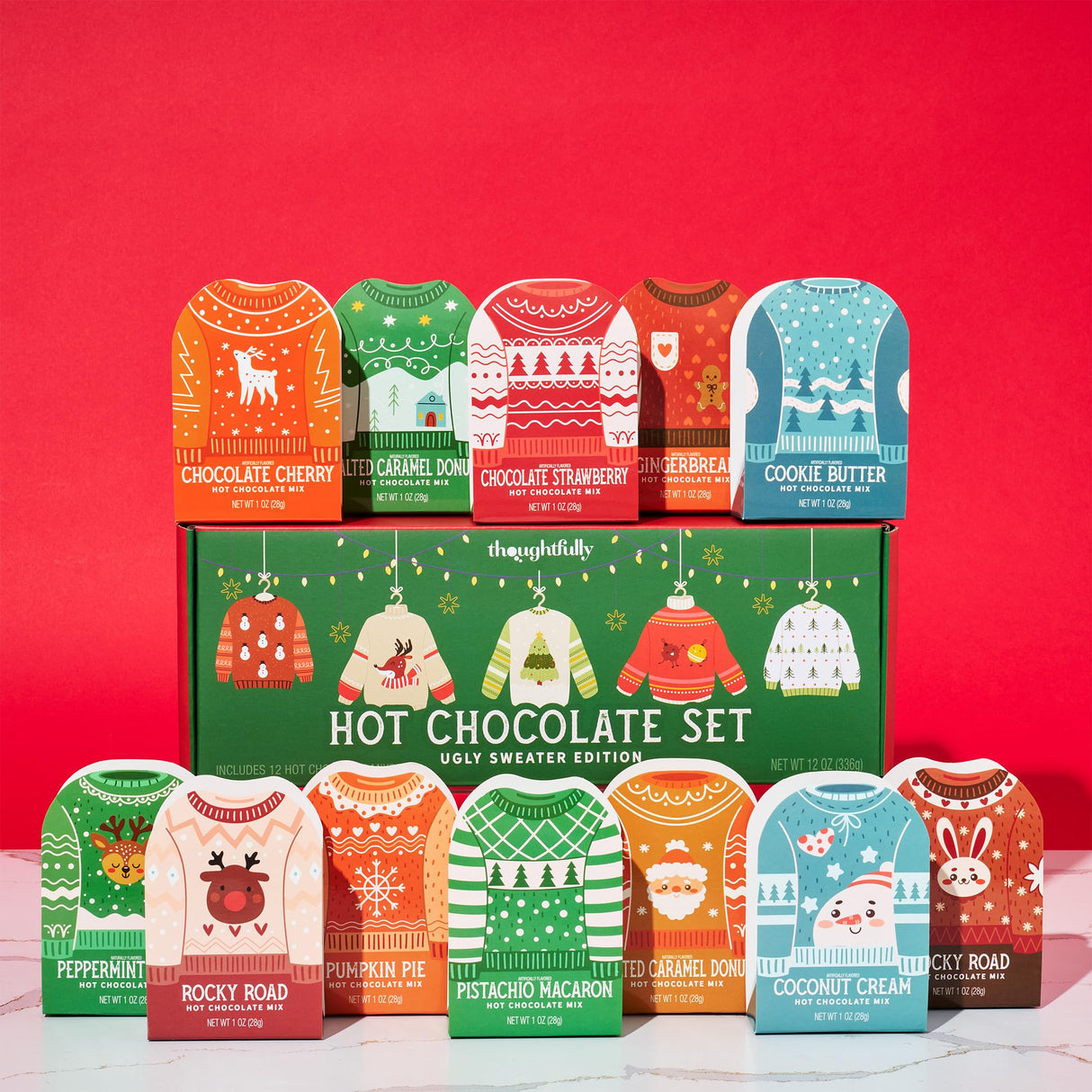 Thoughtfully, Holiday Hot Chocolate Mix Gift Set, Ugly Sweater Cocoa Sampler with 12 Flavored Packets Including Peppermint, Gingerbread, Rocky Road & More, Christmas Gift Box, Set of 12
