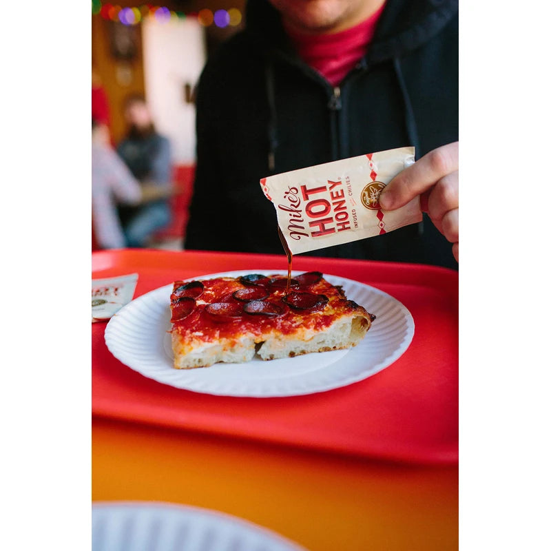 Mikeâ€™s Hot Honey 0.75 Oz Single Serve Packets (12 Packet Box), Honey With a Kick, Sweetness & Heat, 100% Pure Honey, Gluten-Free & Paleo